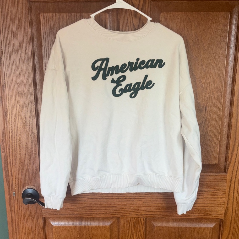 American Eagle Cream Pullover with Green Logo